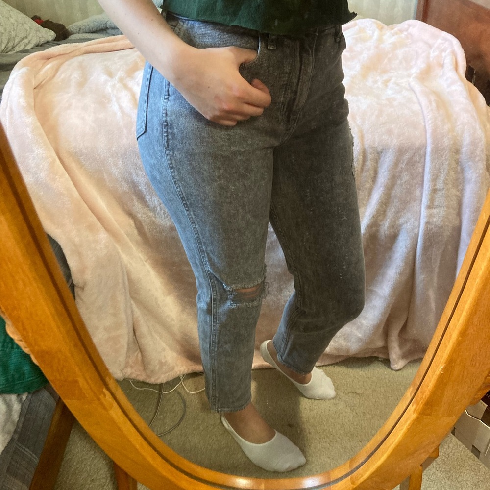 Ultra high-rise ripped faded black mom jeans